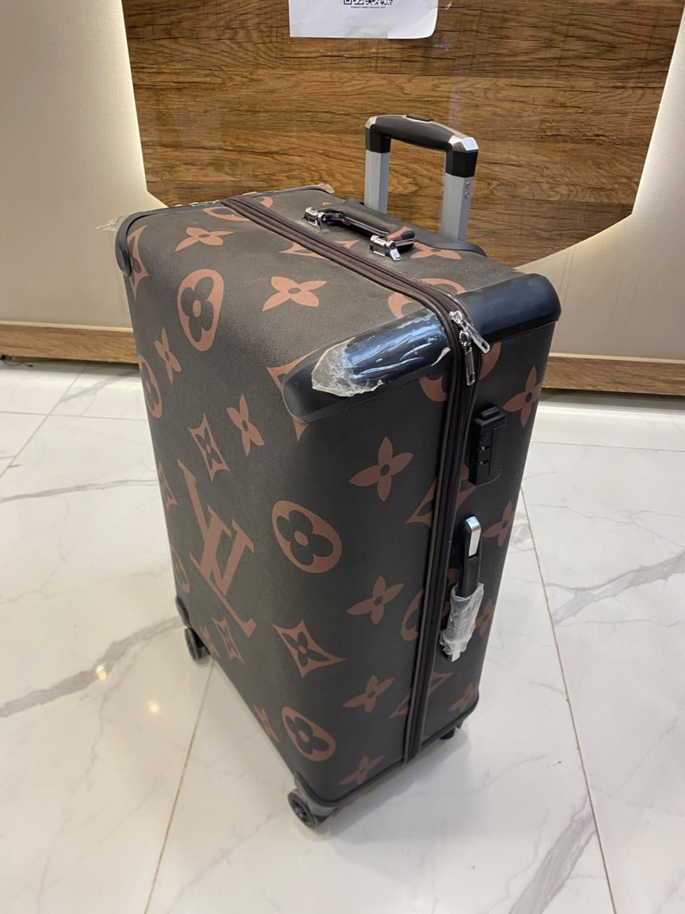 LV luggage brown